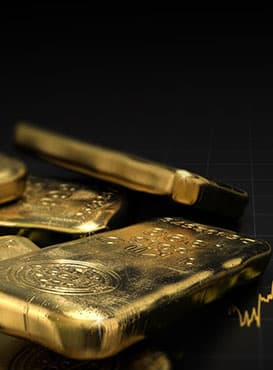 Gold bars arranged in a vault